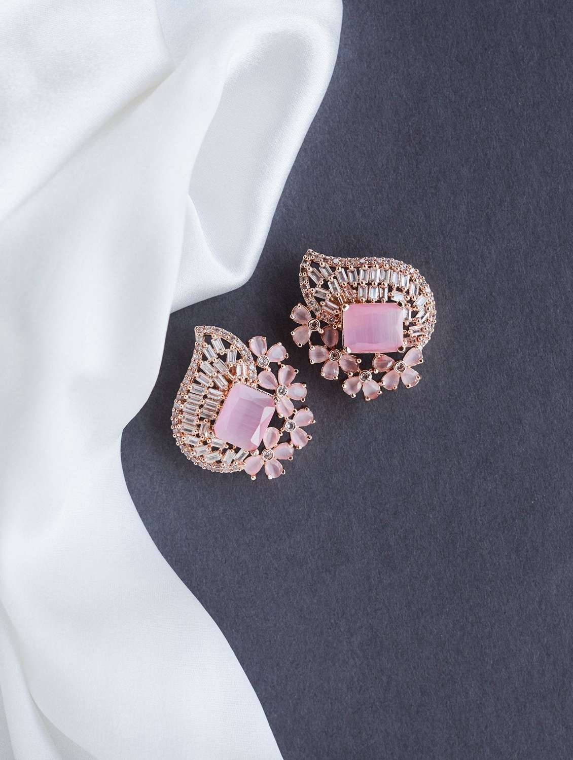 women stone studded stud earrings