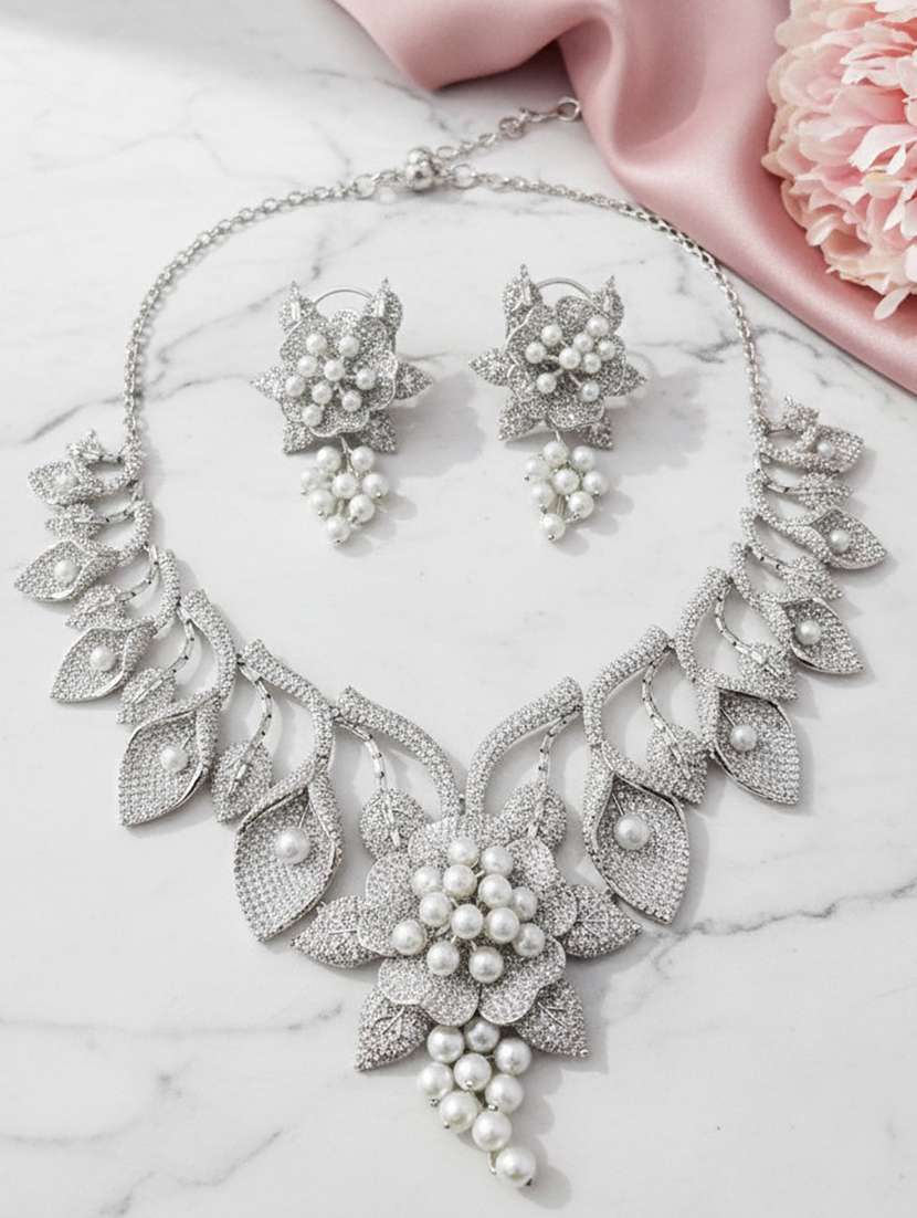 women stone studded necklace and earring set