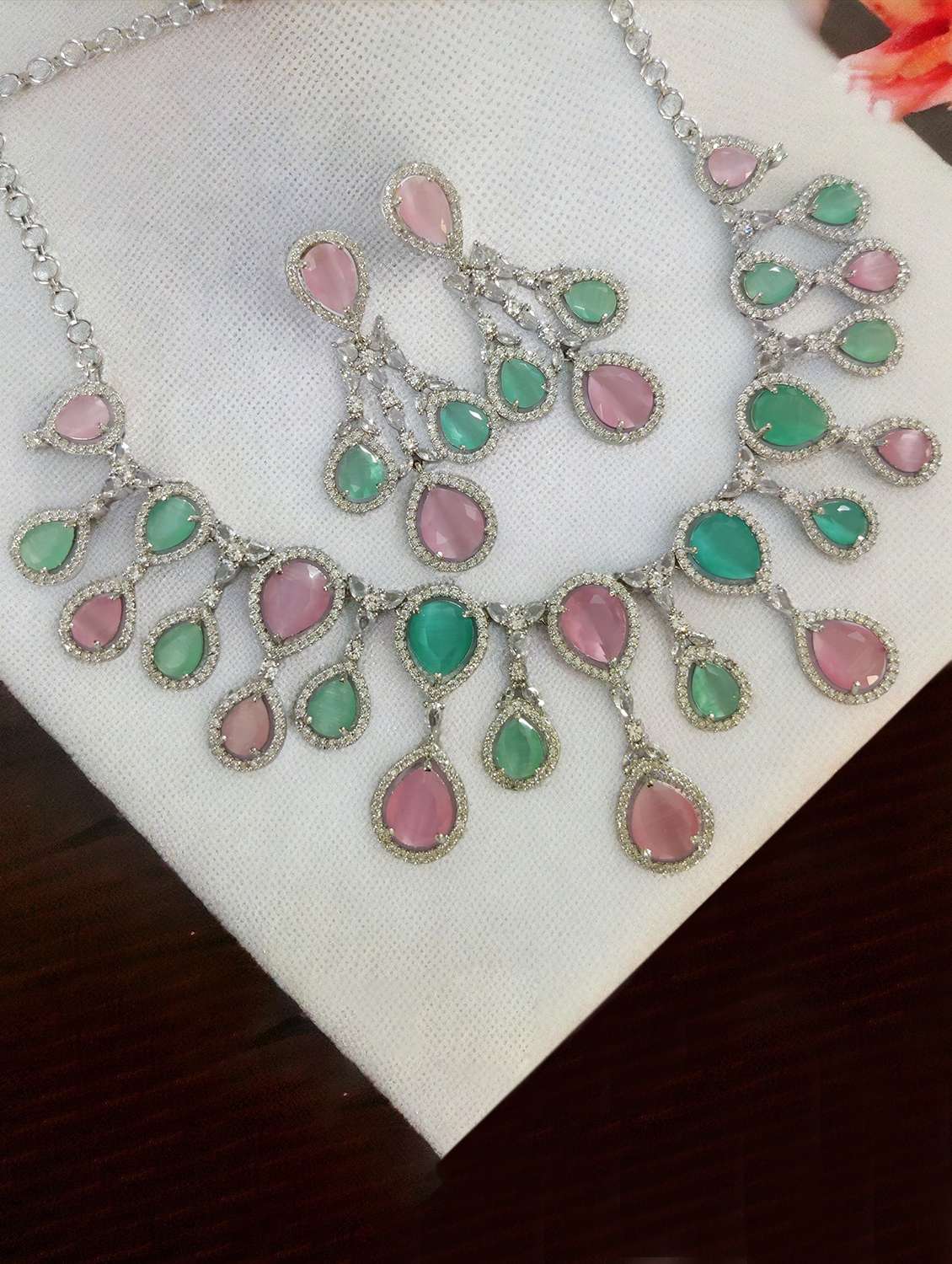 women stone studded necklace and earring set