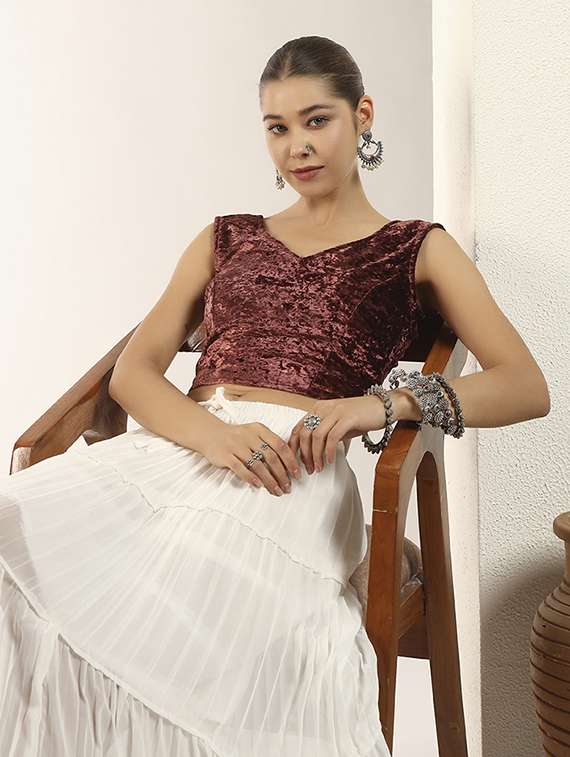 women solid sleeveless stitched blouse