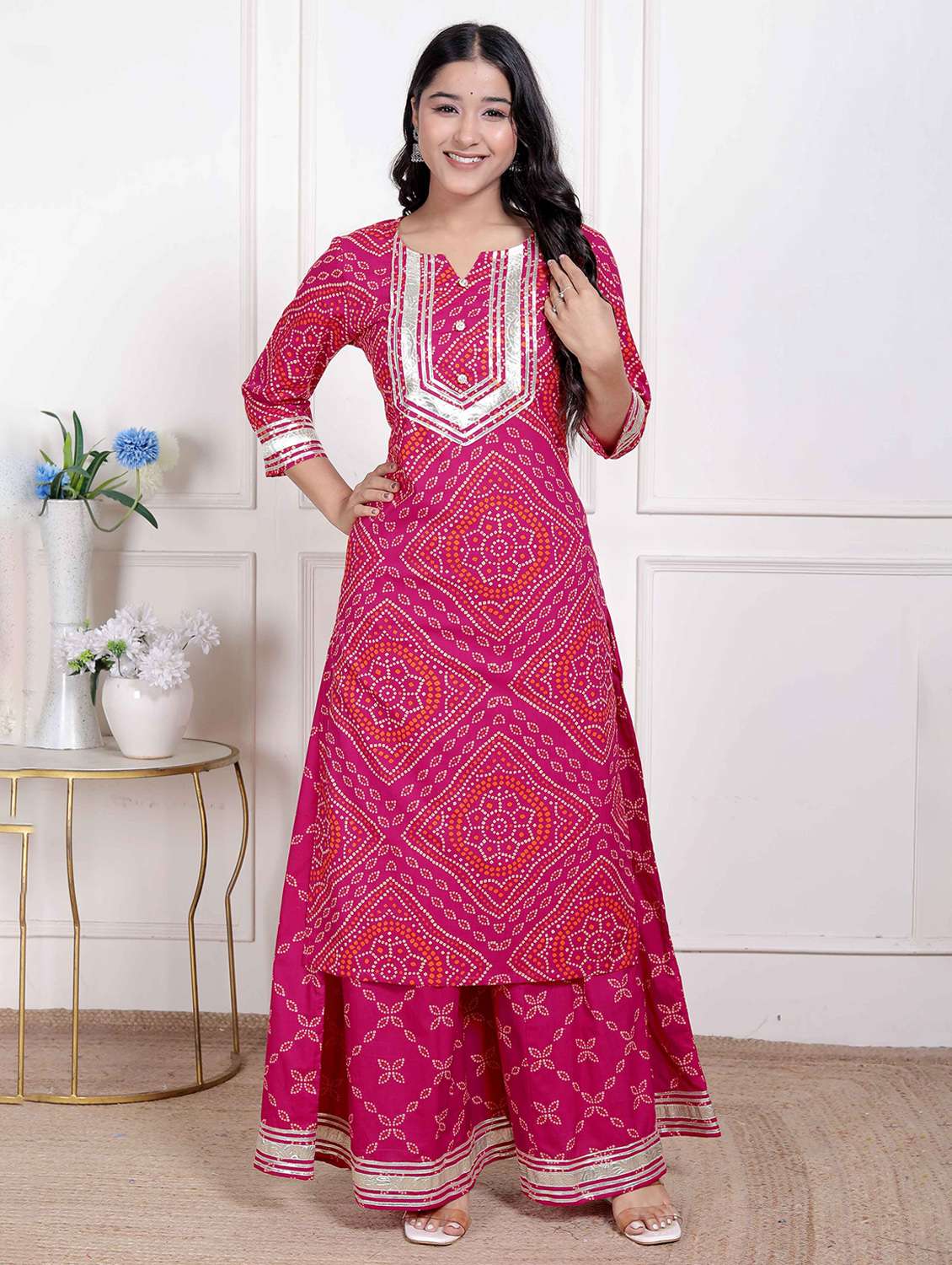 women bandhani three quarter sleeve kurta palazzo set