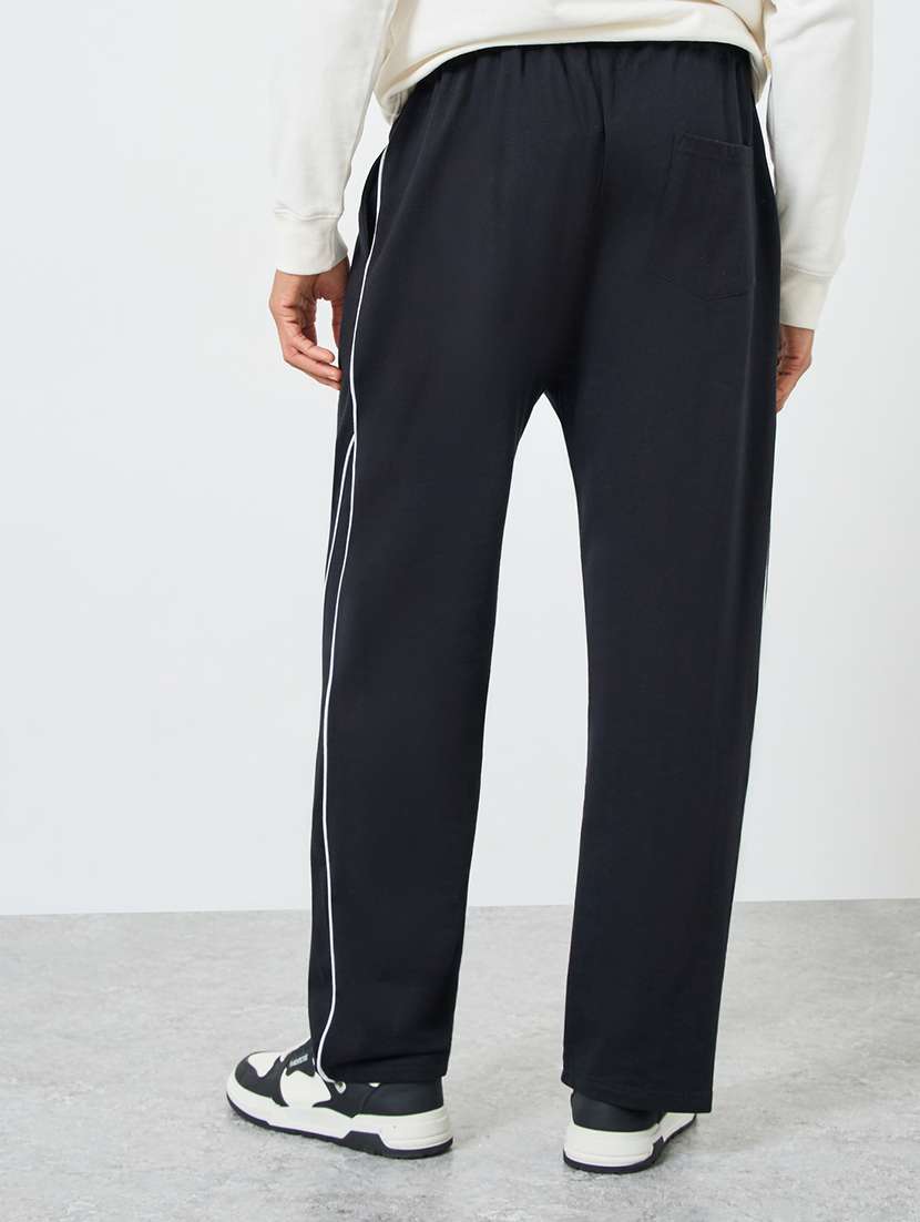 men solid mid rise relaxed fit track pant - 22287903 -  Standard Image - 1