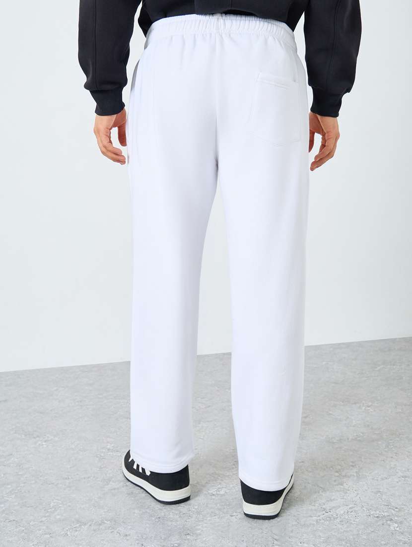 men solid mid rise relaxed fit track pant - 22287905 -  Standard Image - 1