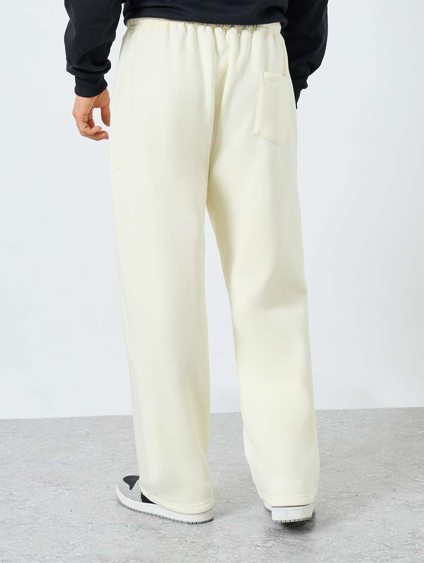 men solid mid rise relaxed fit track pant - 22287908 -  Standard Image - 1