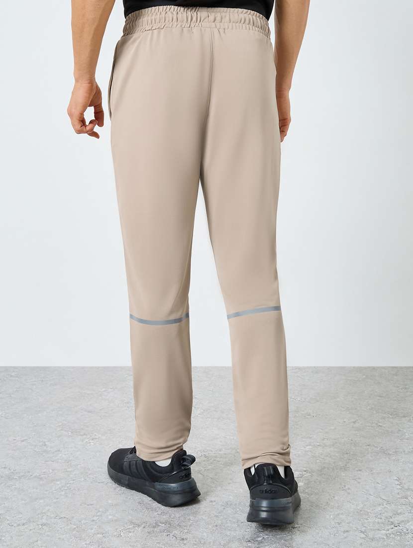 men solid mid rise regular fit track pant - 22287917 -  Standard Image - 1