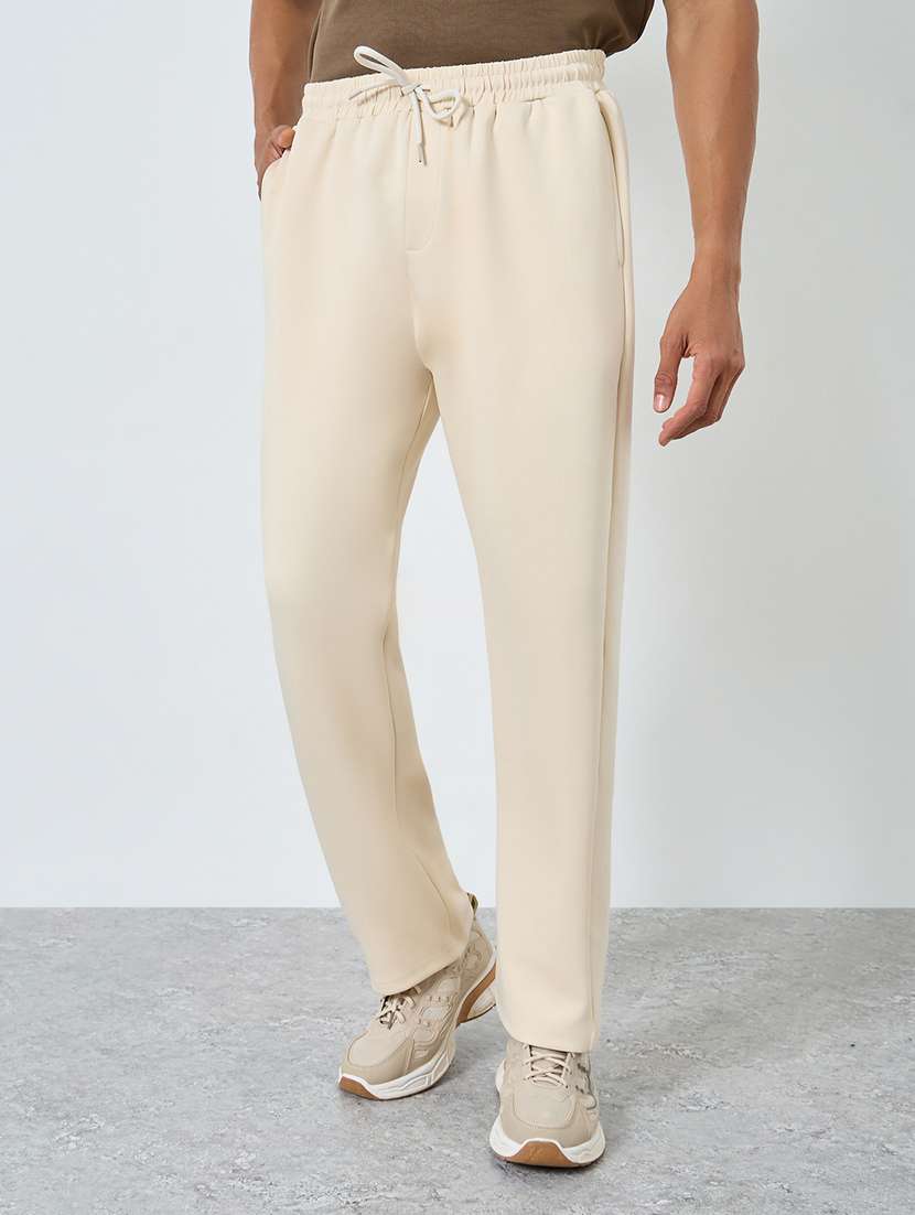 men solid mid rise regular fit track pant