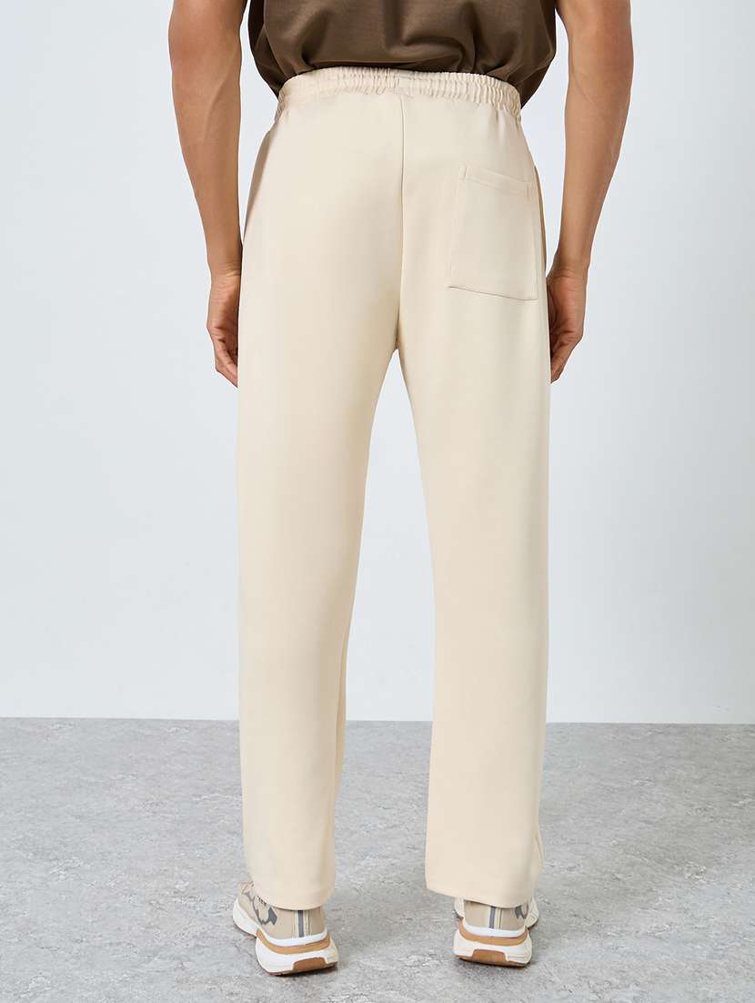 men solid mid rise regular fit track pant - 22287920 -  Standard Image - 1