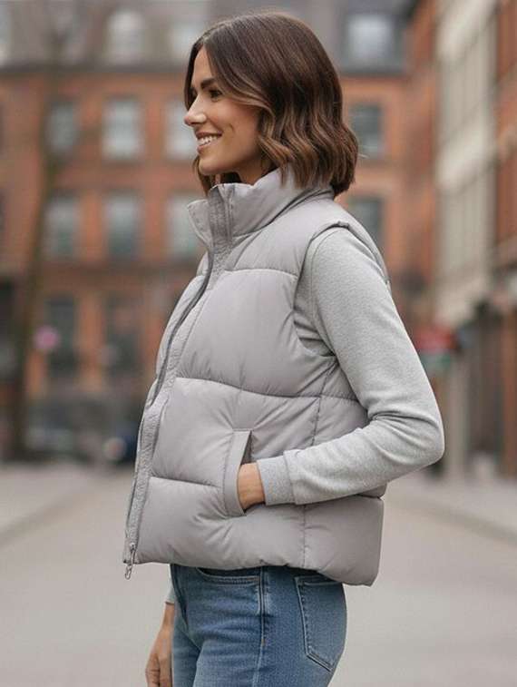 women solid stand collar sleeveless quilted jacket - 22292662 -  Standard Image - 1