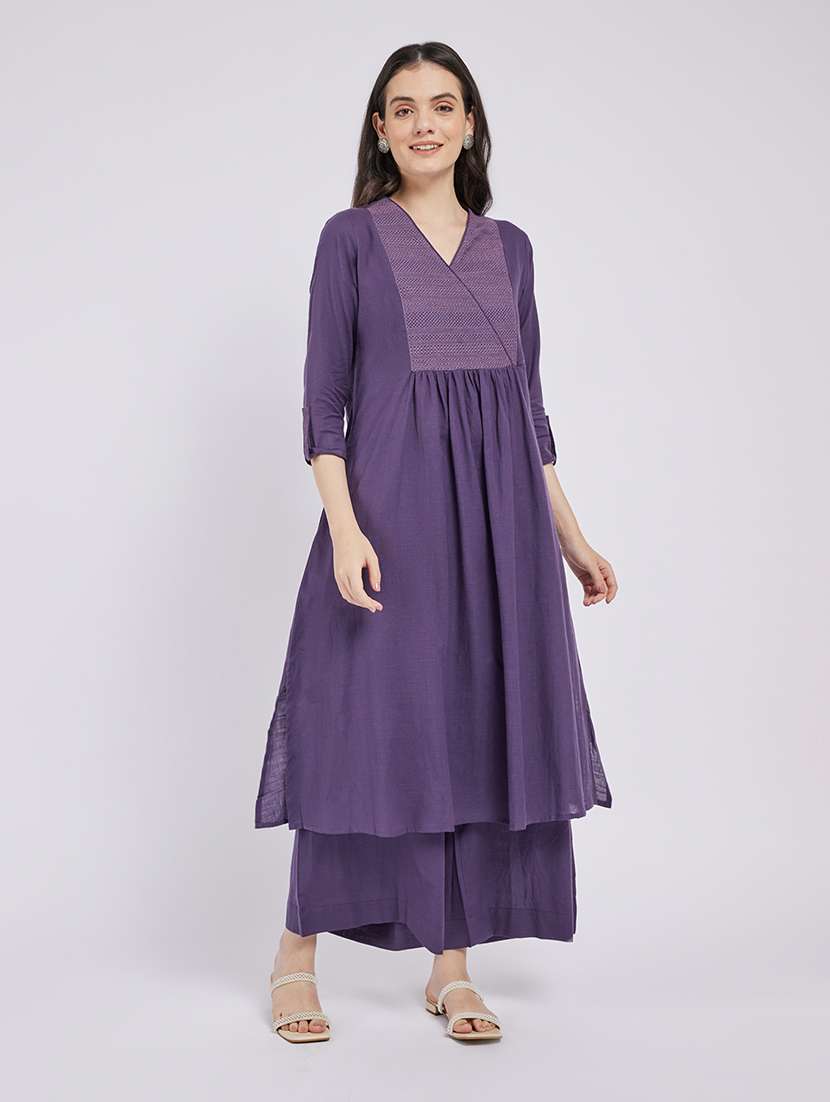 women solid with work three quarter sleeve a-line kurta