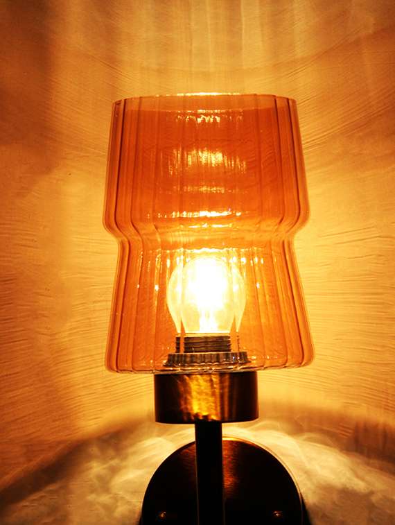 modern brass wall sconce with amber glass shade - 22300393 -  Standard Image - 1