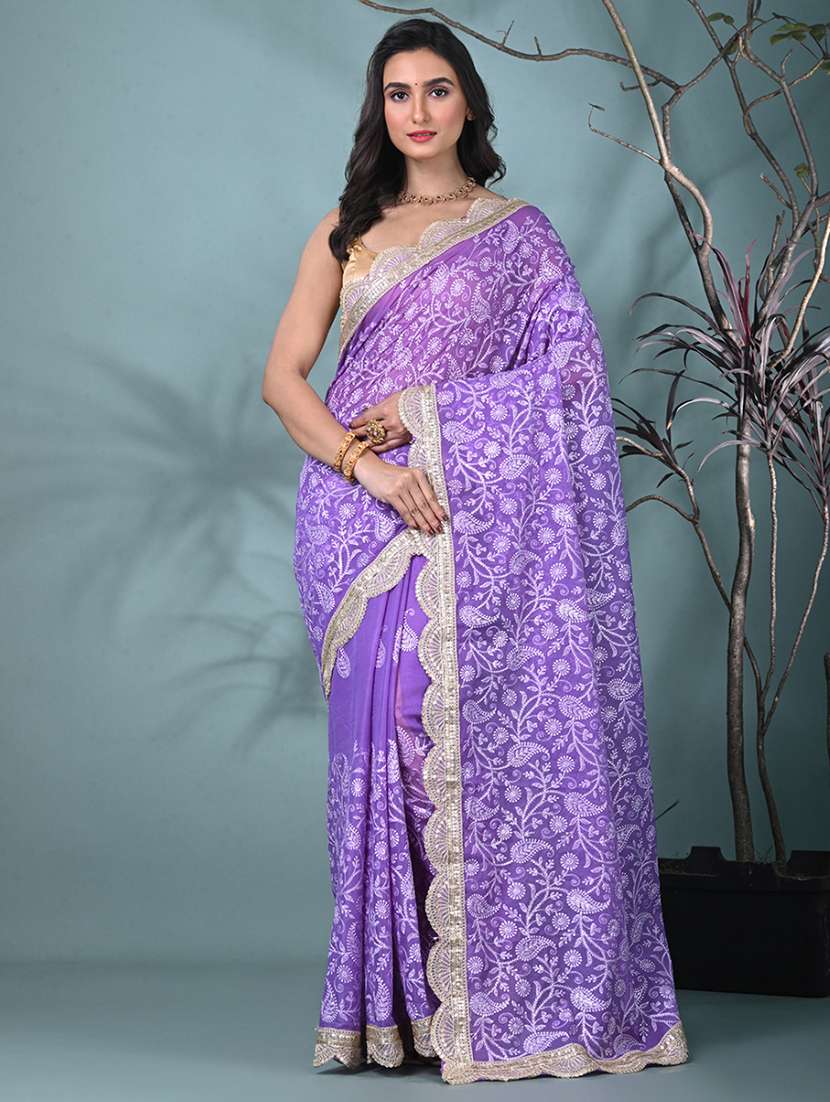 women solid with work embroidered saree with blouse