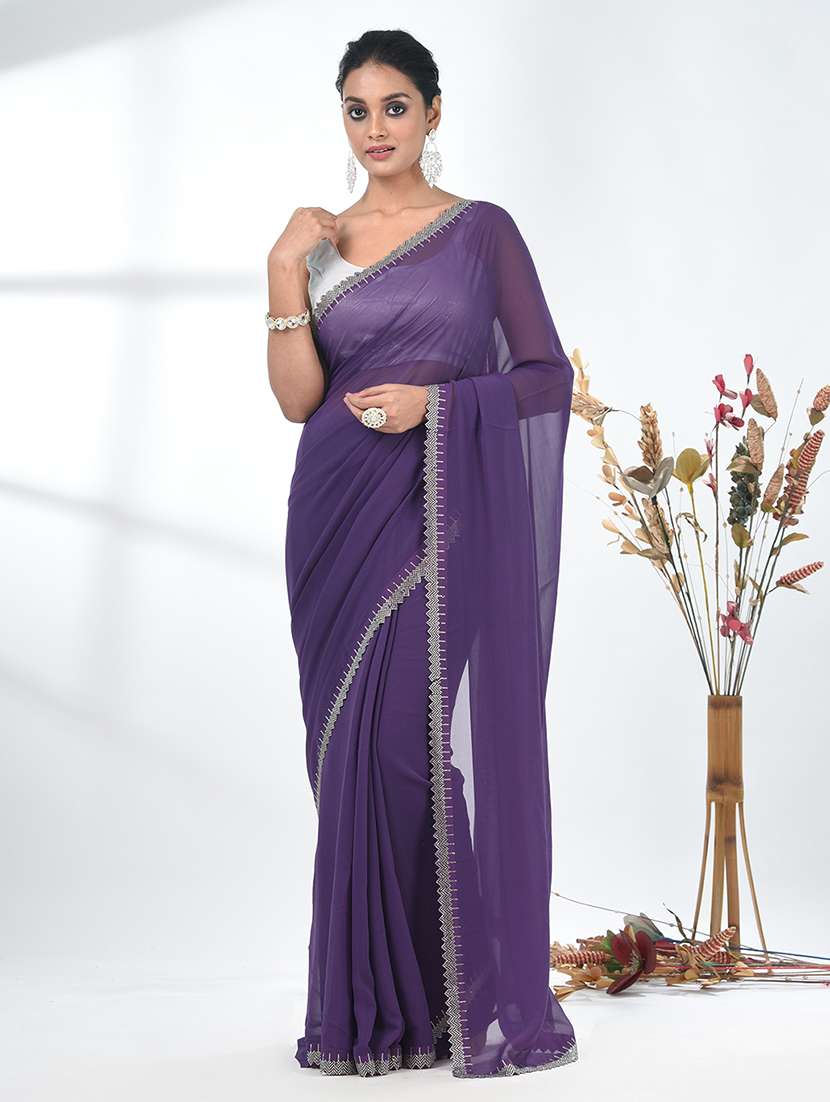 women solid with embellished bordered saree with blouse
