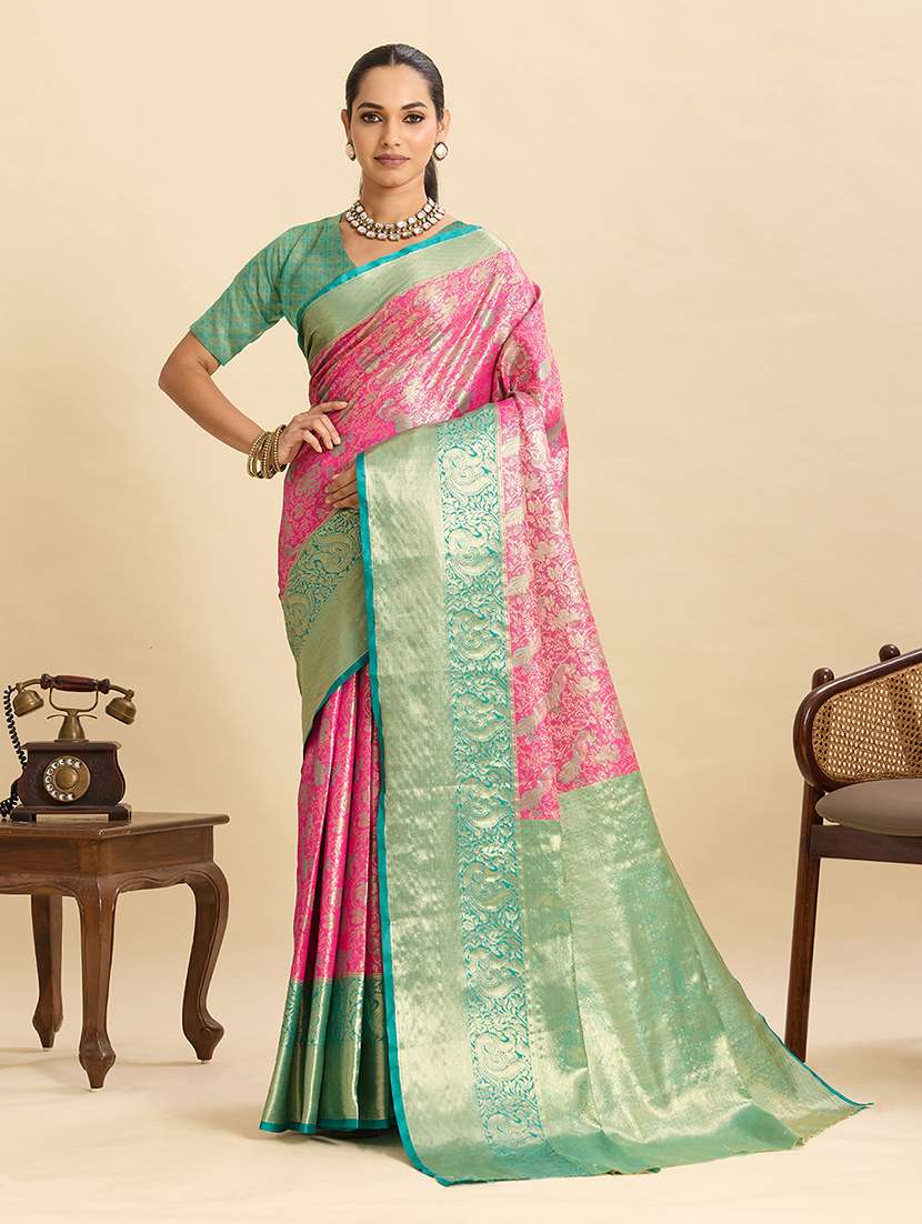 women self design banarasi saree with blouse