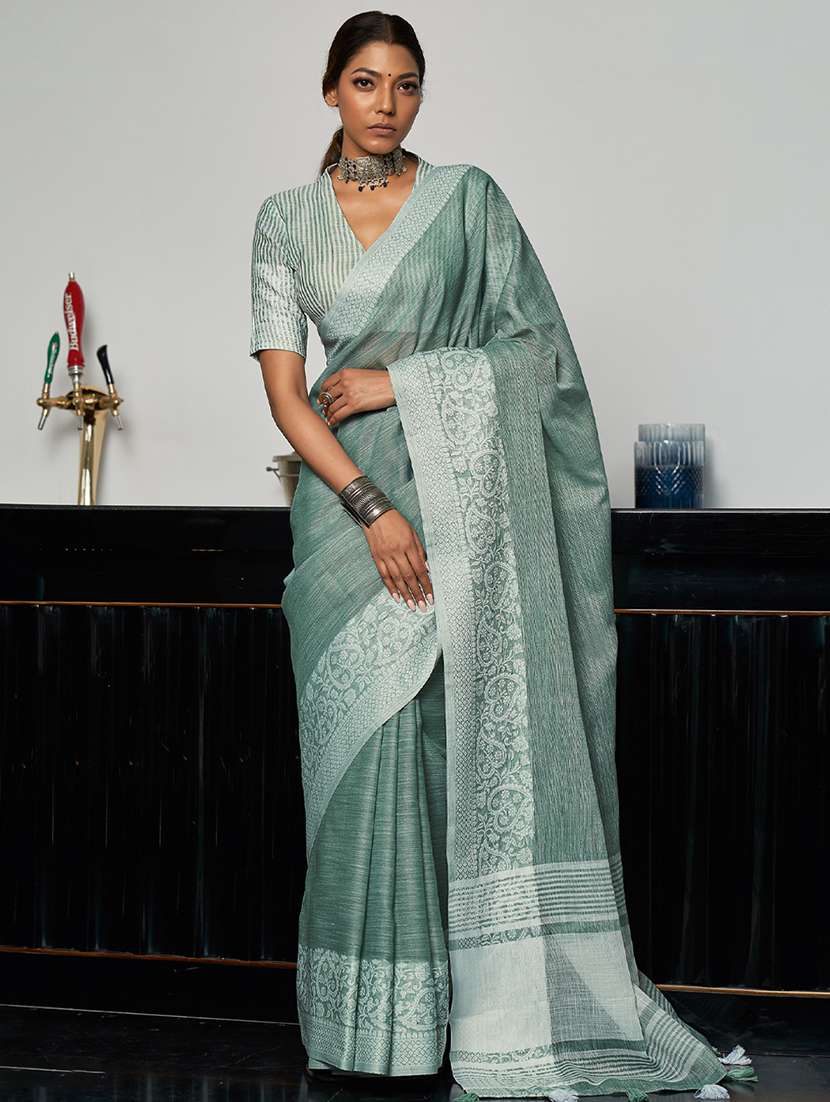 women solid with bordered handloom saree with blouse