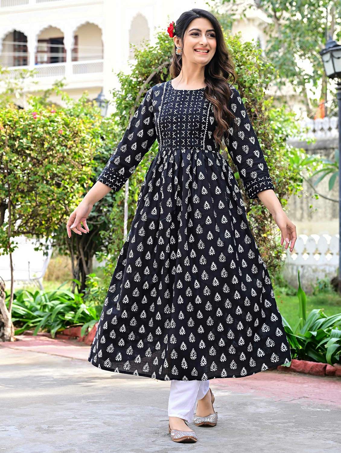 women printed three quarter sleeve a-line kurta