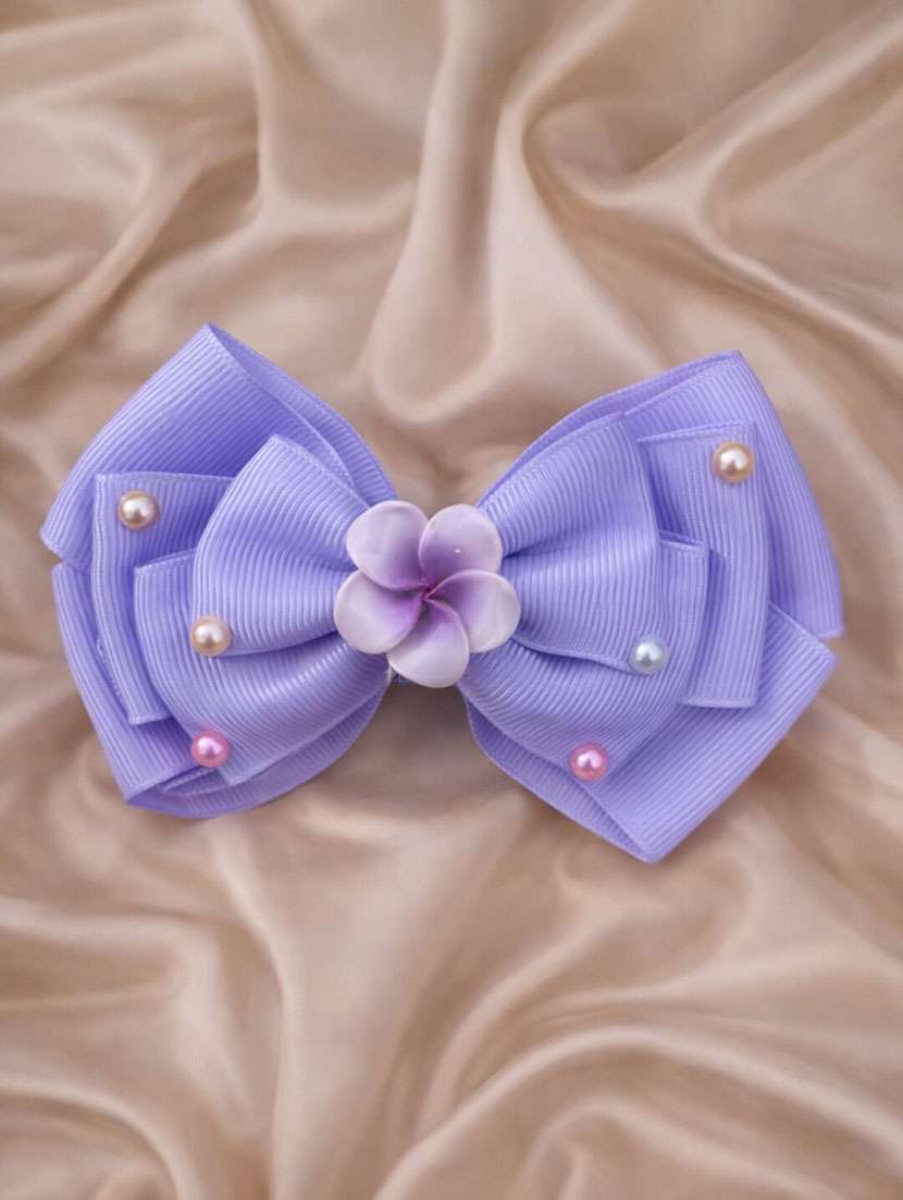purple bow hair clip with floral center & pearls - 22346578 -  Standard Image - 1