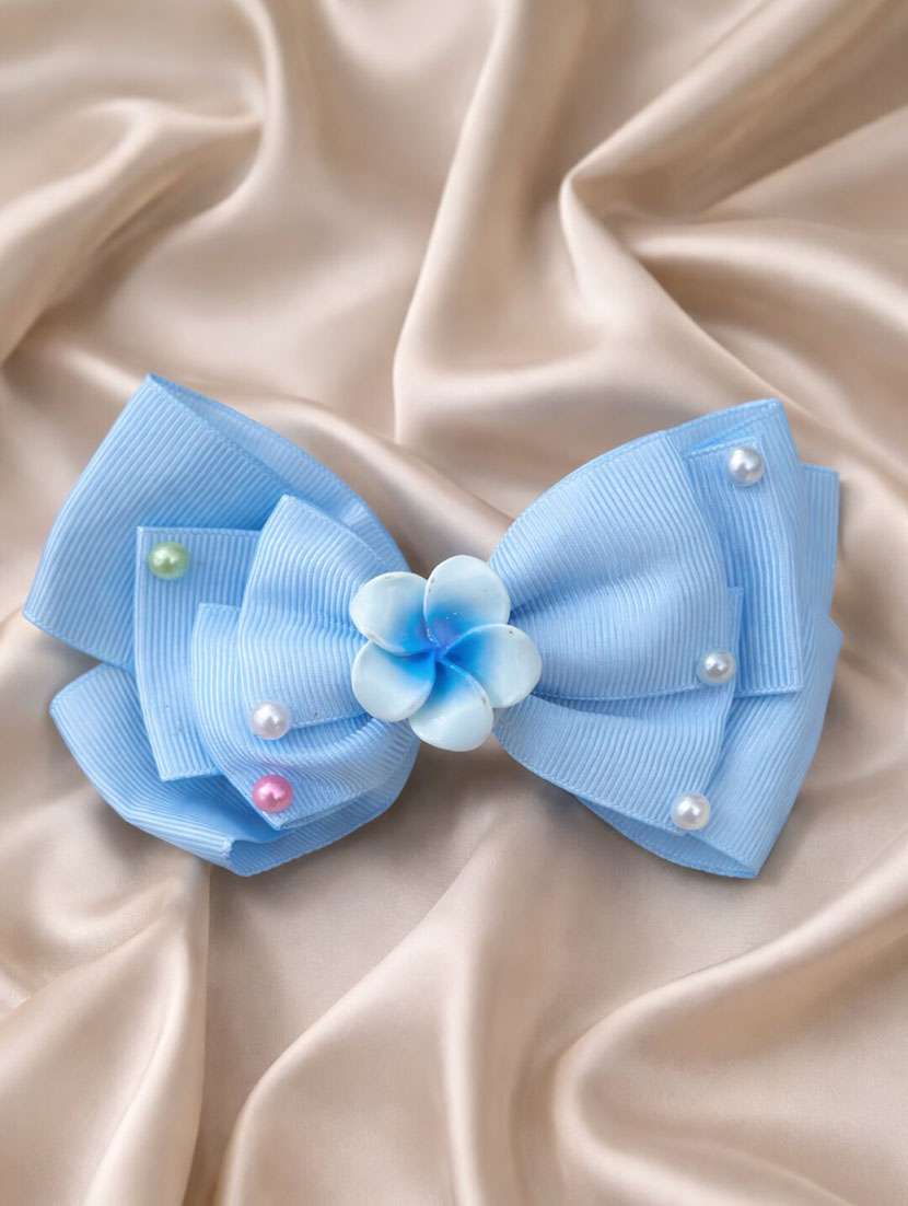 blue bow hair clip with floral center & pearls - 22346579 -  Standard Image - 1