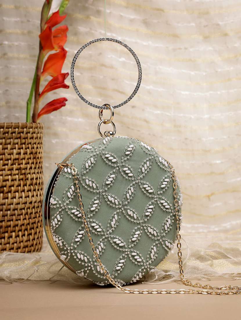 women embellished clutch with sling chain