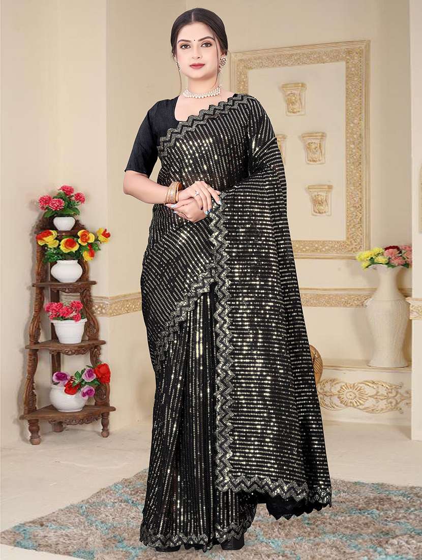 women solid with work embellished saree with blouse