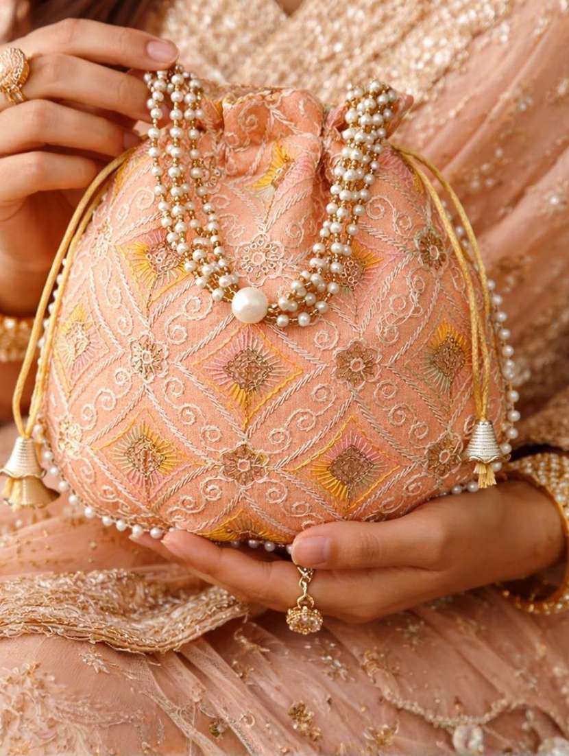 women embroidered potli bag - 22373608 -  Standard Image - 1