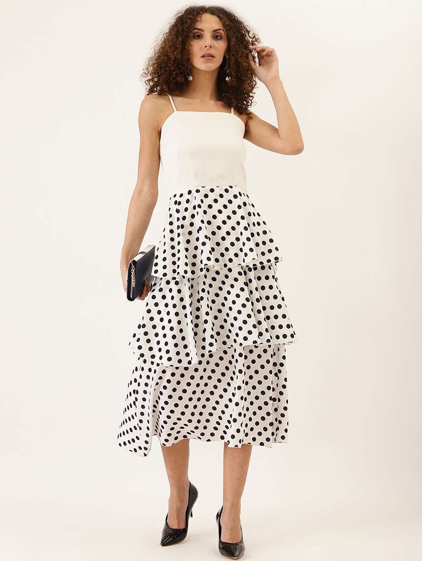 women polka doted shoulder layered dress