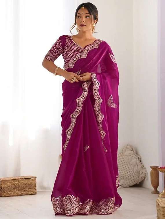 women solid with work embroidered saree with blouse