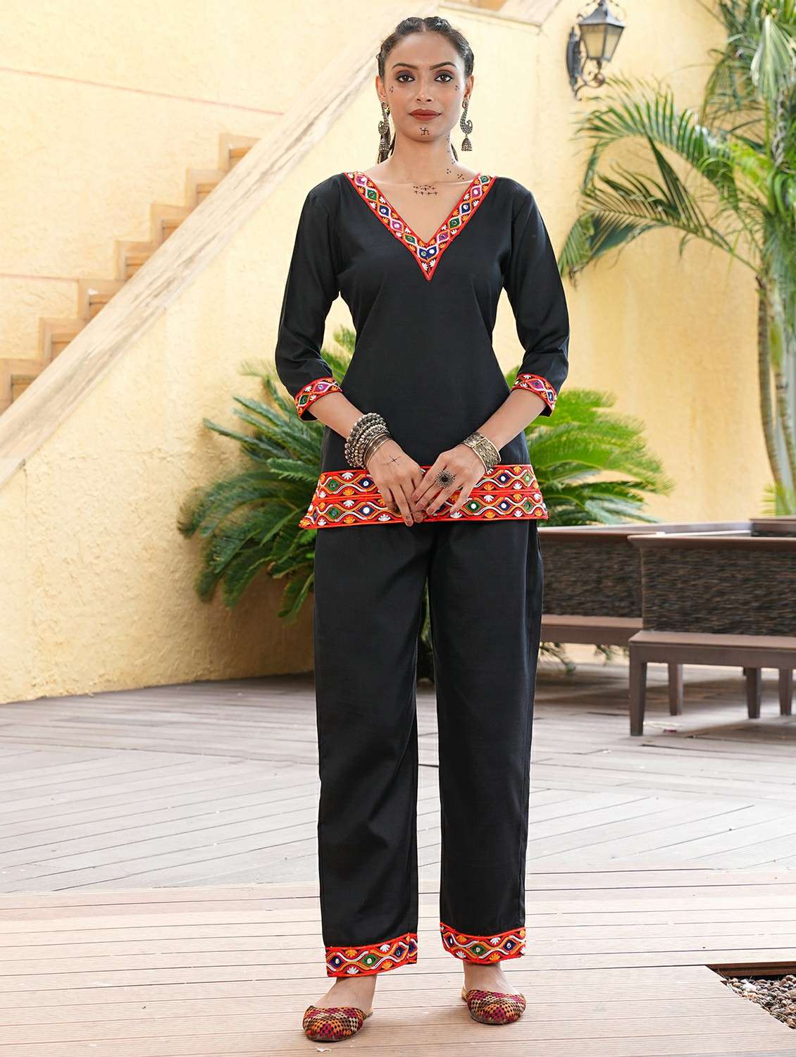 women solid with work three quarter sleeve straight kurti
