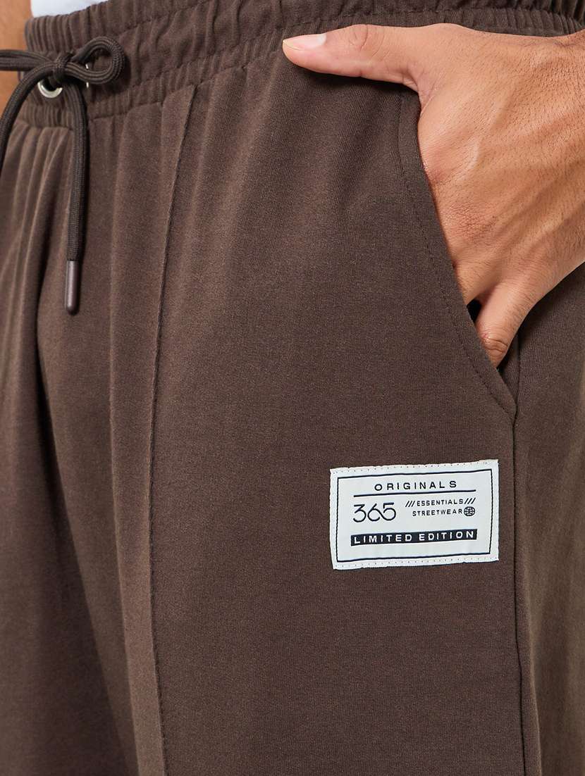 men solid mid rise full length track pant - 22394911 -  Standard Image - 1