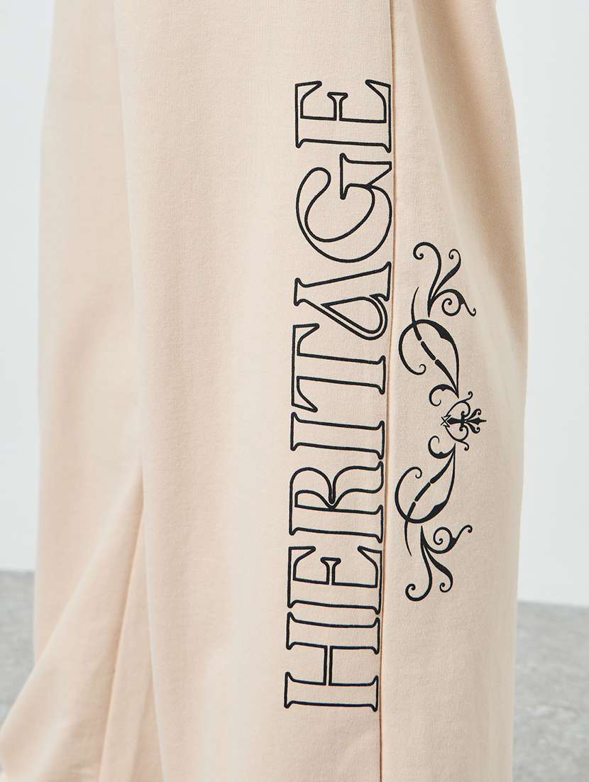 men typographic relaxed fit full length track pant - 22394912 -  Standard Image - 4