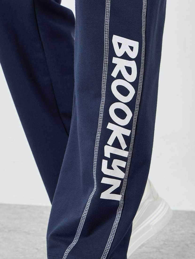 men typographic mid rise full length track pant - 22394915 -  Standard Image - 1