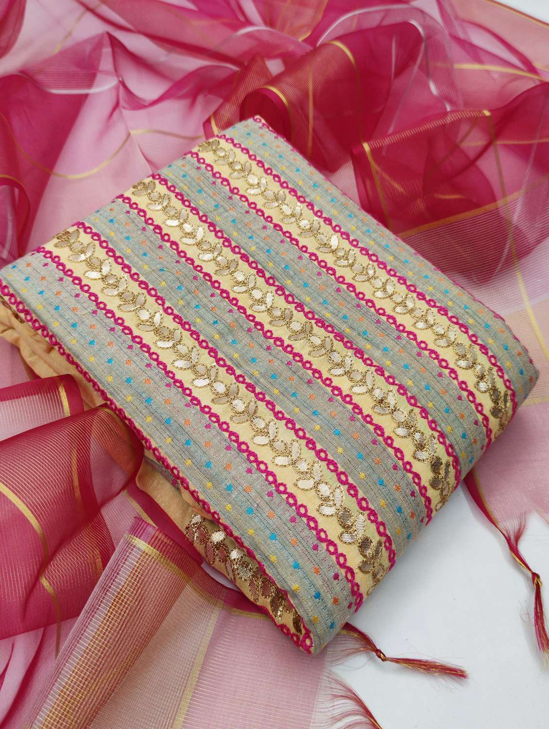 women self design unstitched suit set