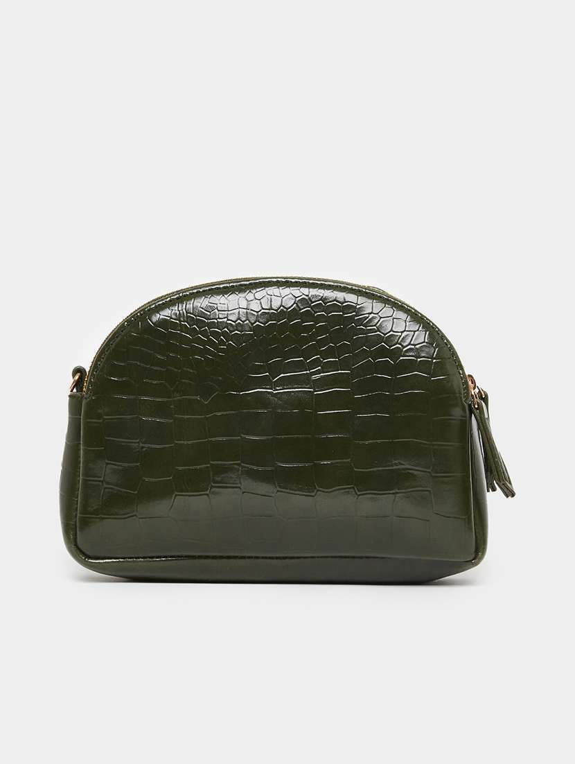 women green textured sling bag