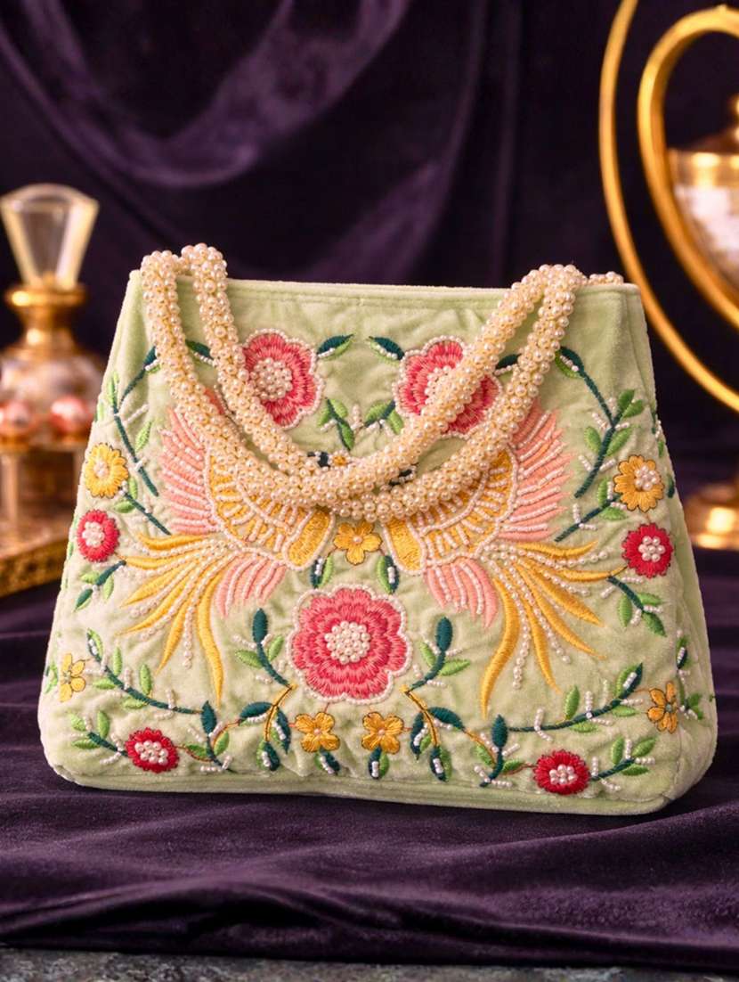 women solid with work embroidered potli