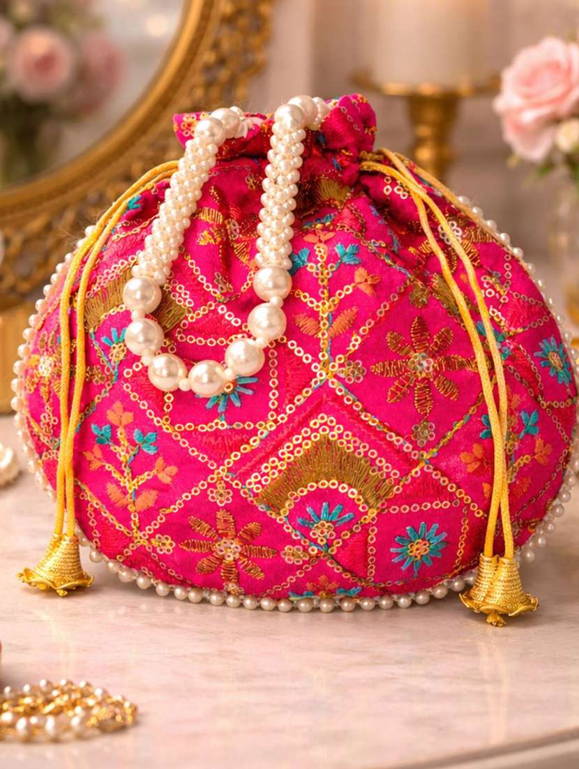 women solid with work embroidered potli