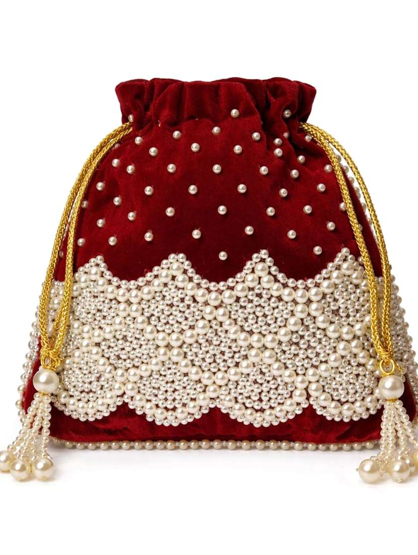 women solid with work embellished potli