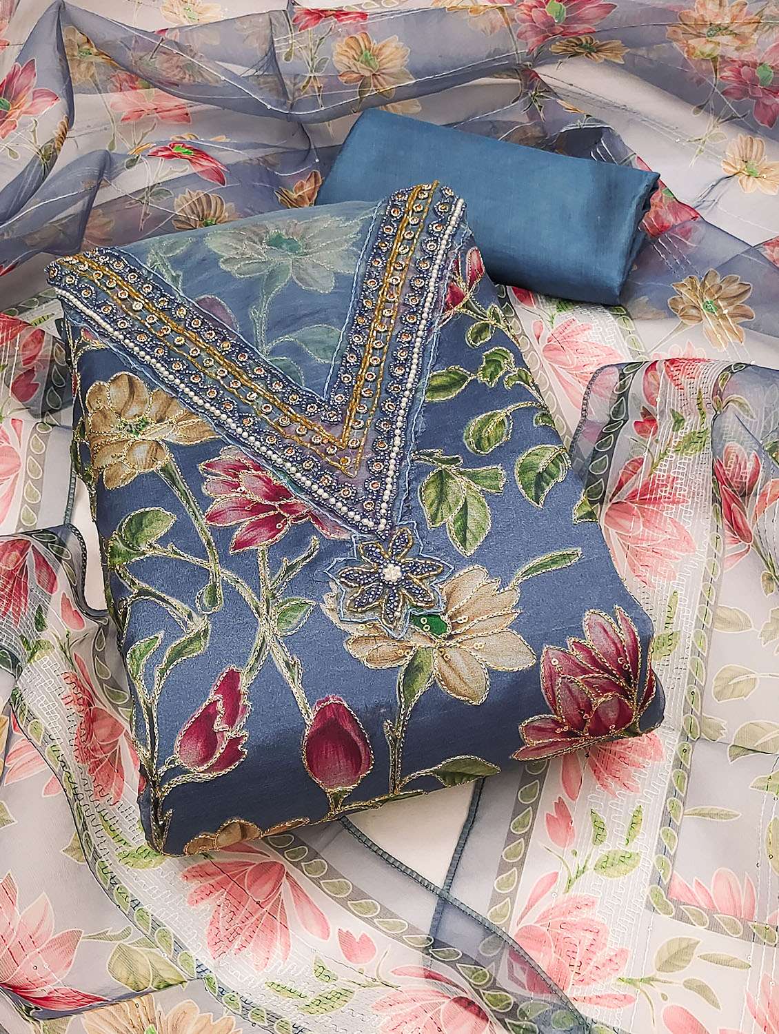 women printed unstitched suit set