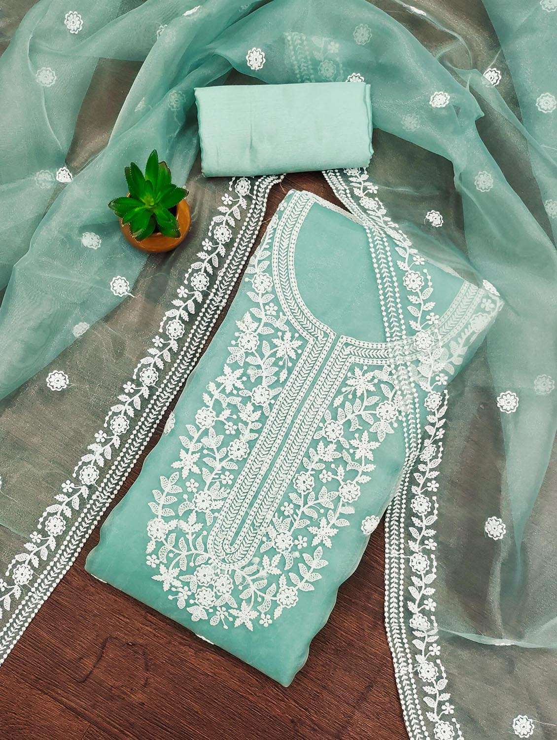 women solid with work unstitched suit set