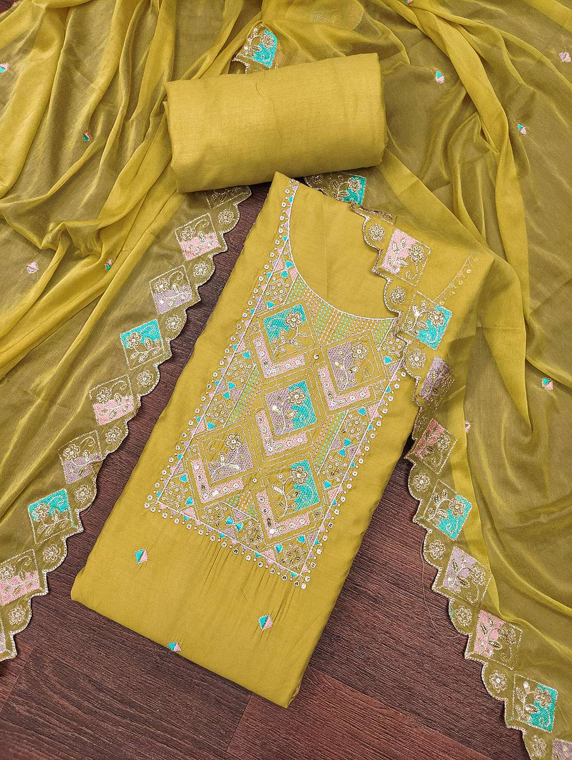 women solid with work unstitched suit set
