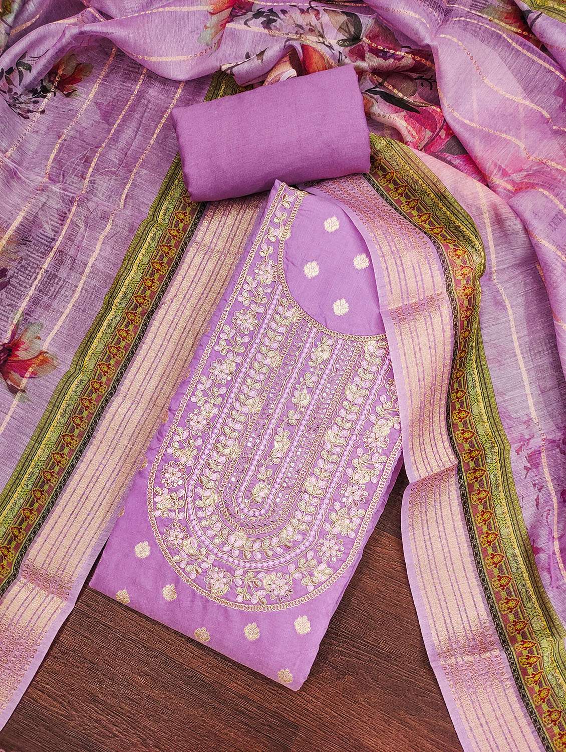 women self design unstitched suit set