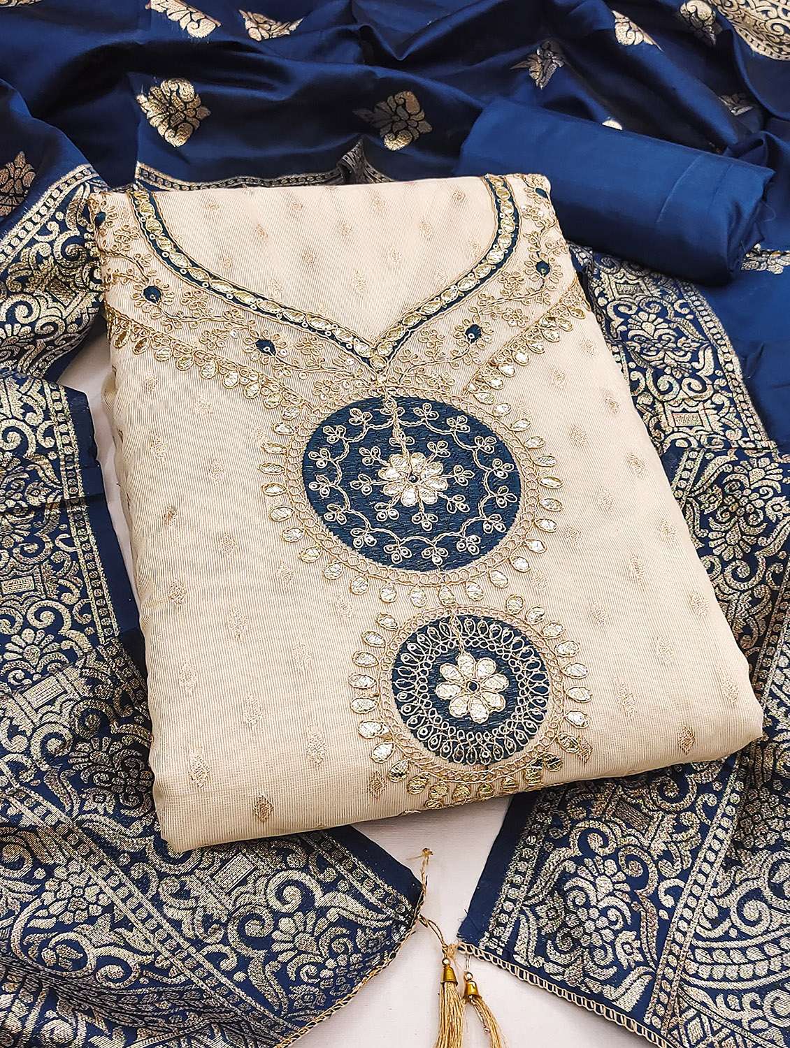 women self design unstitched suit set