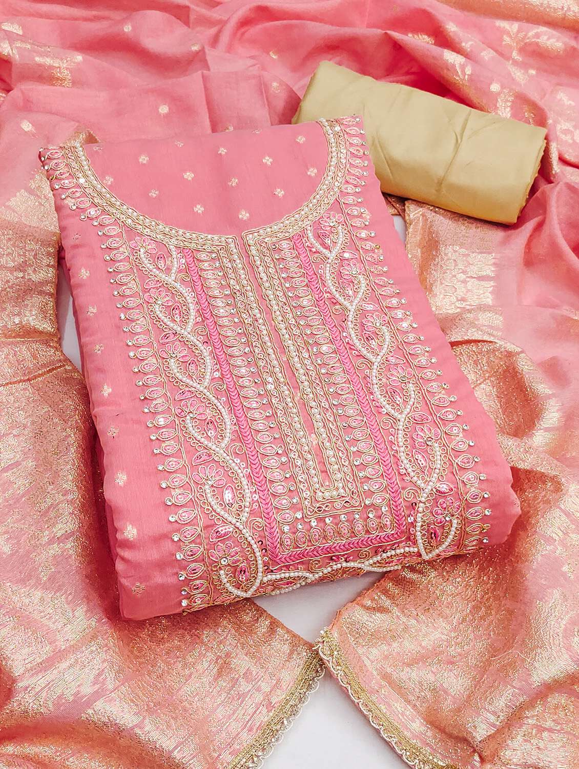 women self design unstitched suit set