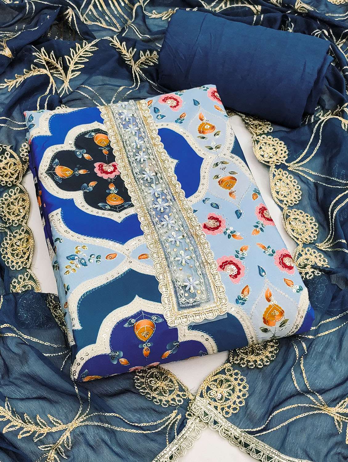 women printed unstitched suit set
