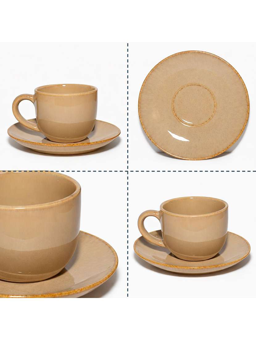 brown ceramic coffee mug and saucer - 22435953 -  Standard Image - 1