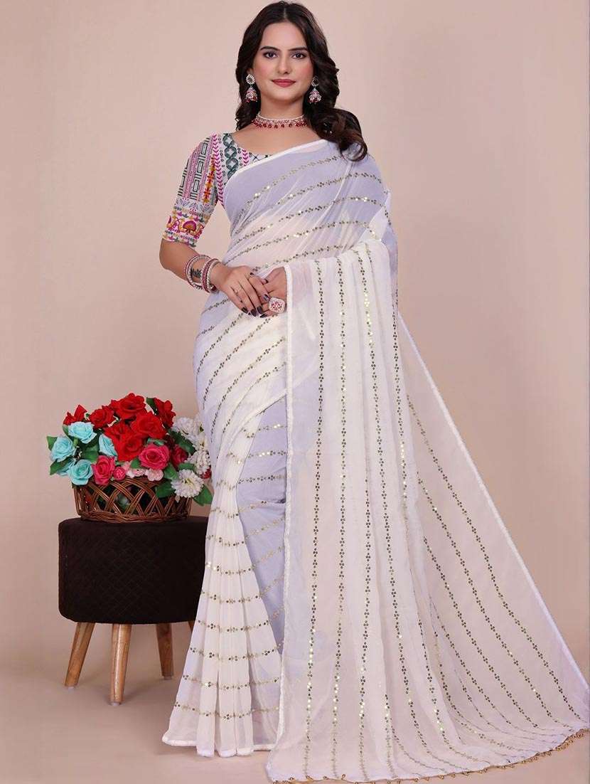 women solid with work embellished saree with blouse