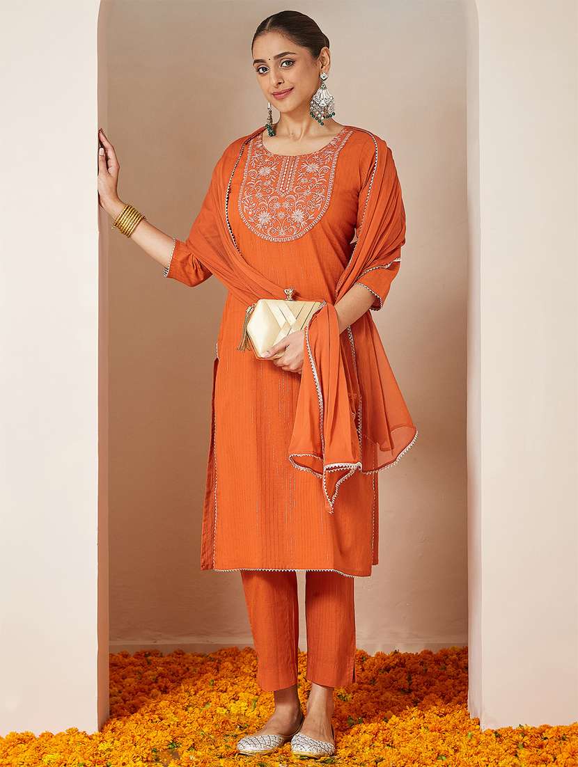 women orange kurta dupatta set