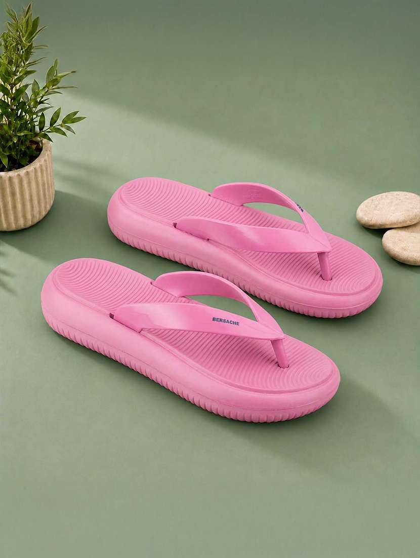 women pink color flip flops