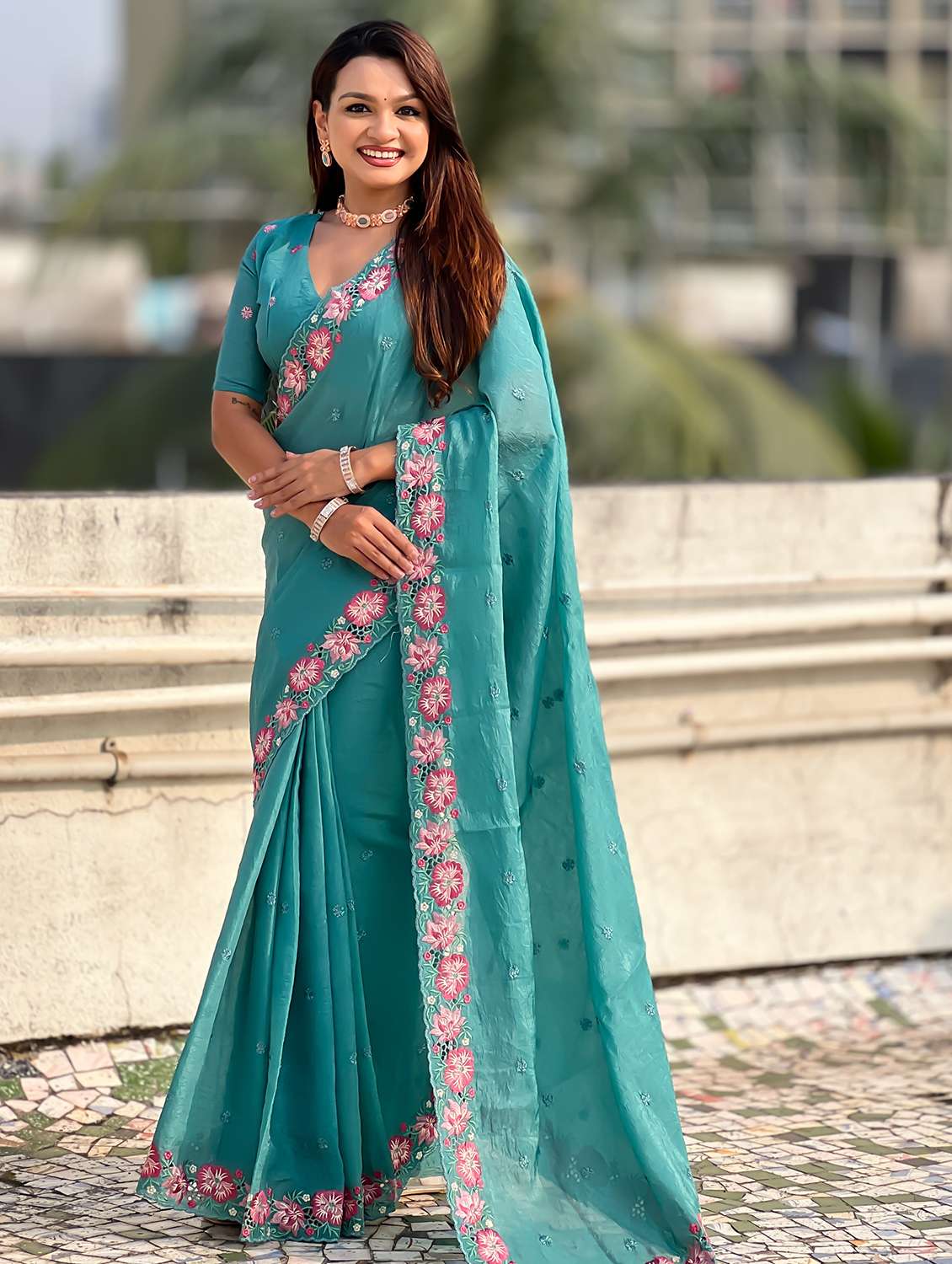 women solid with work embroidered saree with blouse