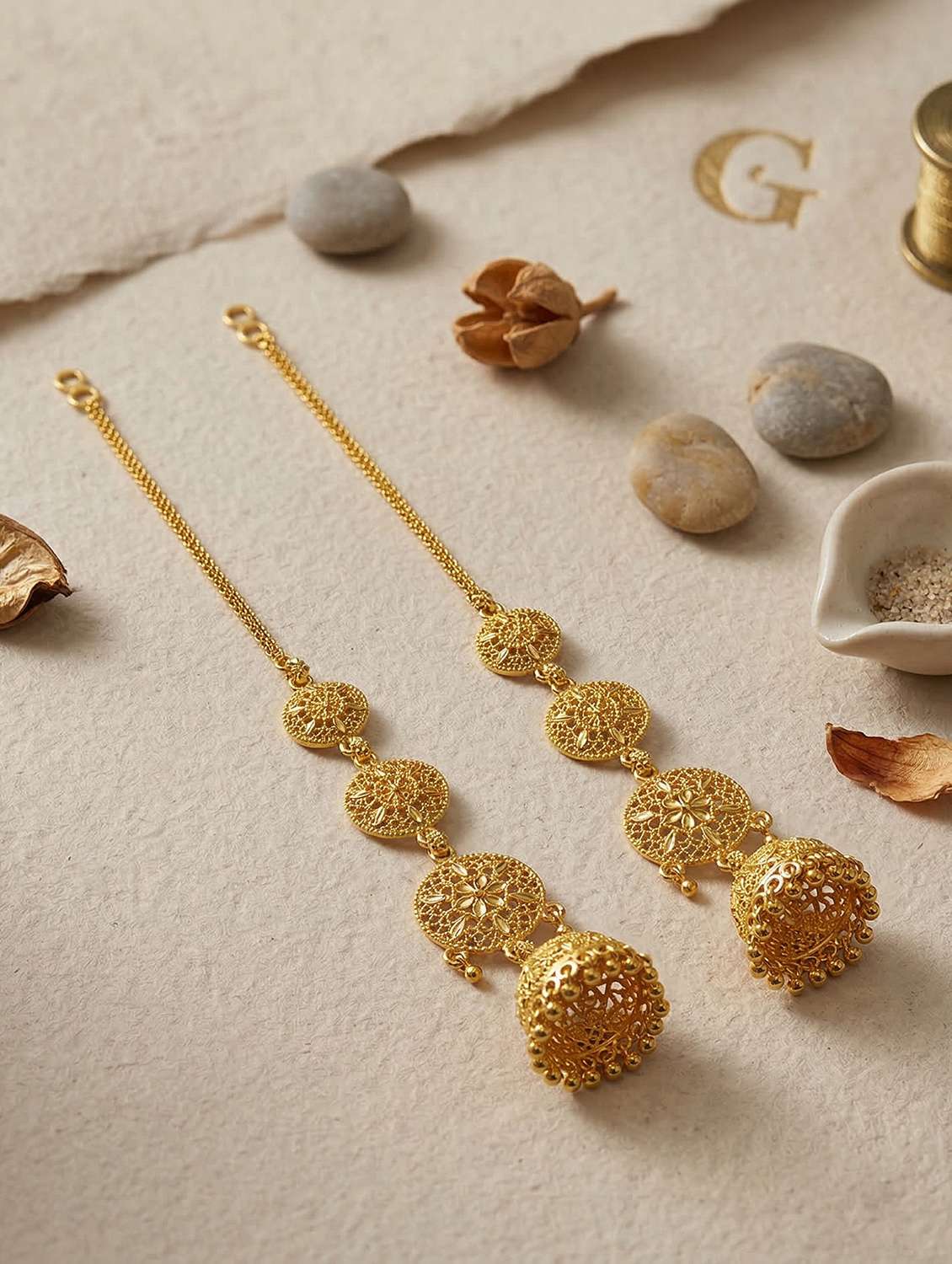 women gold brass jhumka earring