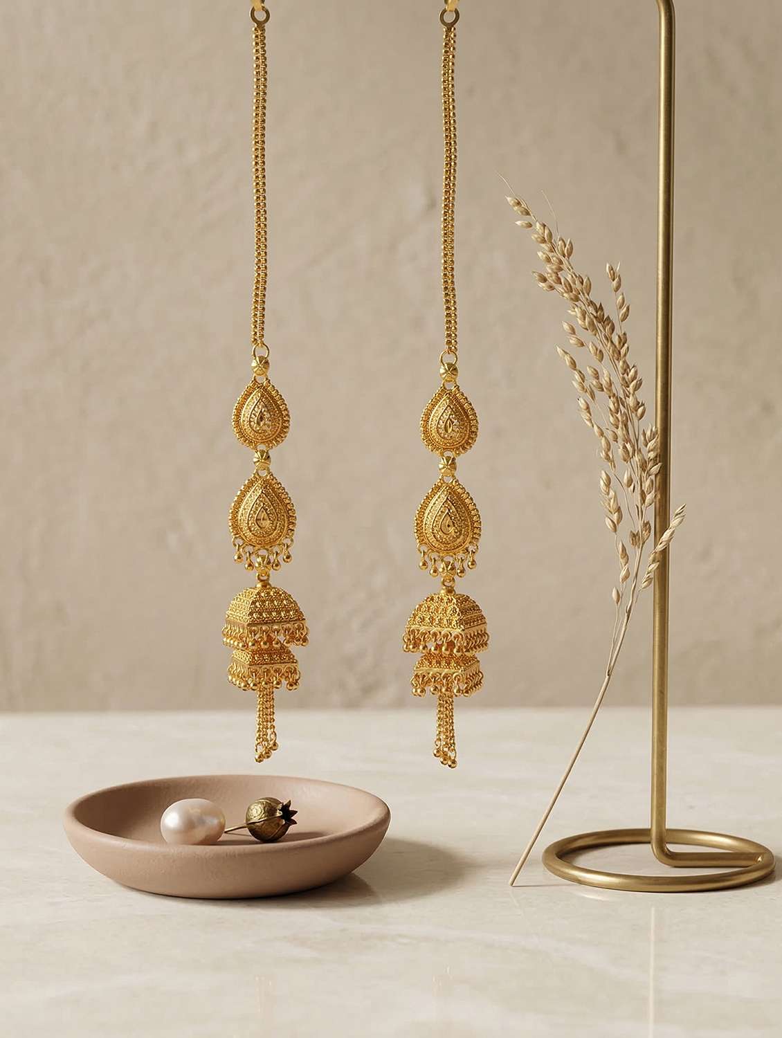 women gold brass jhumka earring