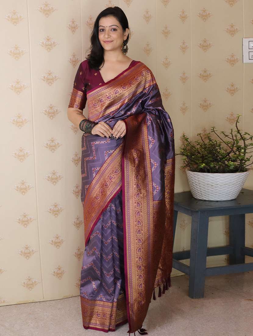 women self design banarasi saree with blouse